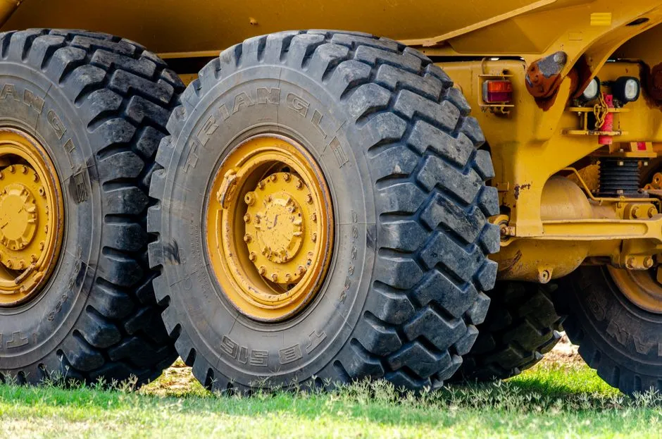 Close-up of a commercial truck's tire and wheel assembly, part of the air brake foundation system